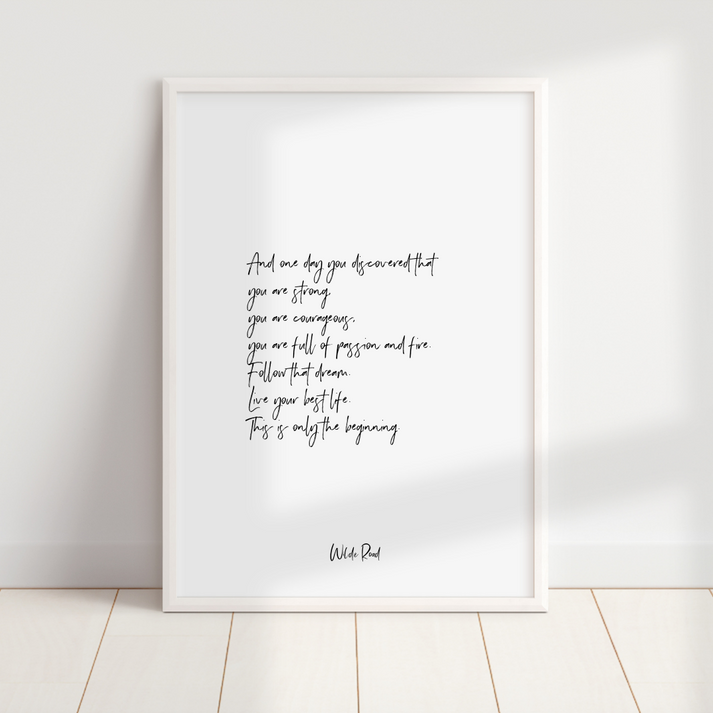 'And One Day You Discovered' typography print by Wilde Road in A4 size on a white wall