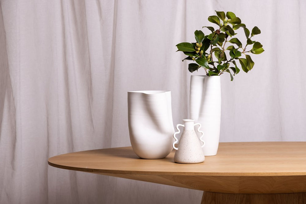 Vault Vase grouped with smaller vessels
