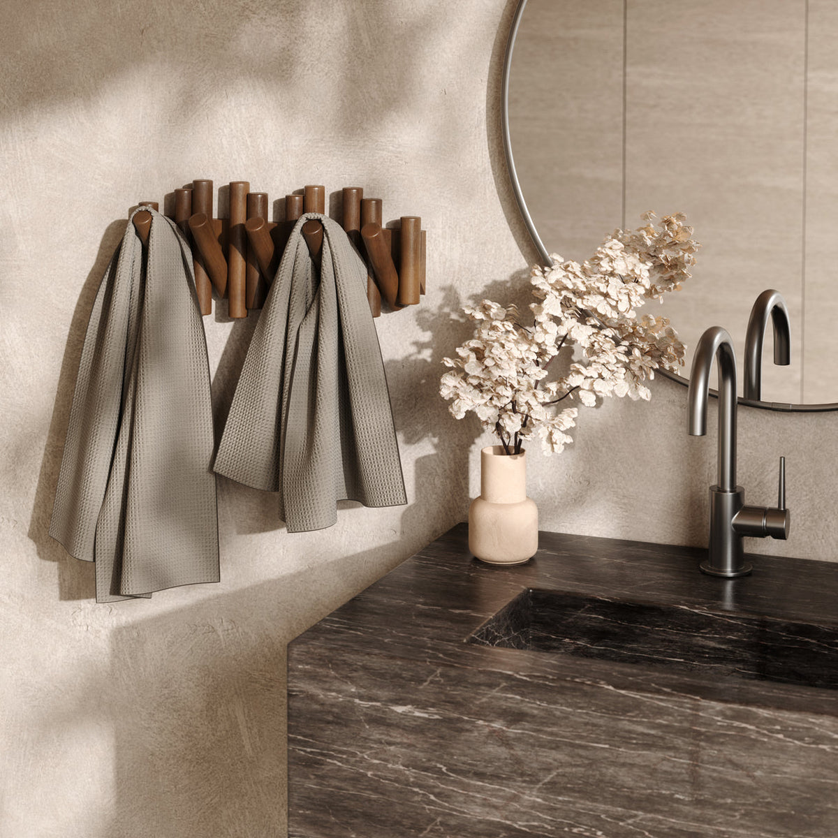 Umbra Picket wall hook in aged walnut mounted in an entryway