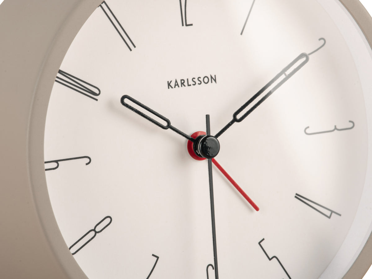 Close-up of the White Belle alarm clock dial with baton markers