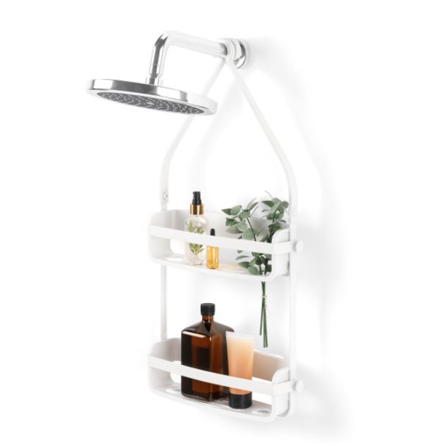 White Umbra Flex shower caddy hanging from a shower head, holding bottles and a plant