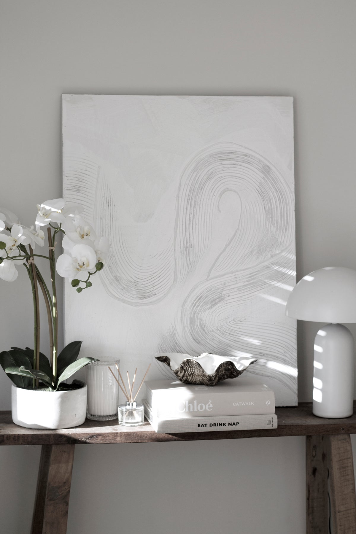 Resin clam shell dish styled as a centrepiece