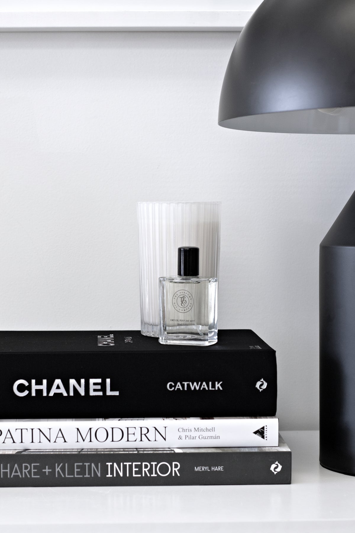 Chanel Catwalk hardback book styled on a console table