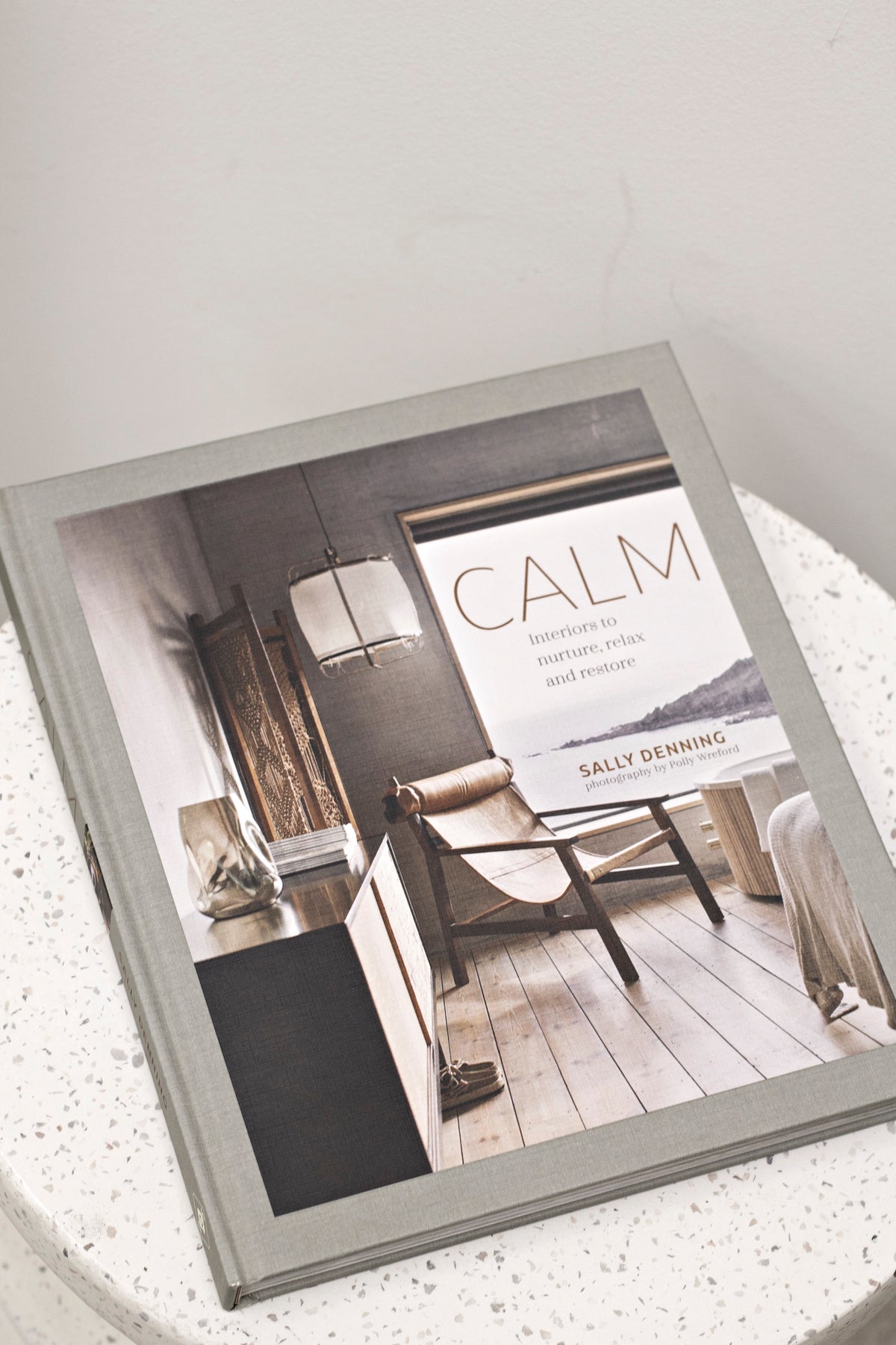 Calm interiors book page spread showing natural textures