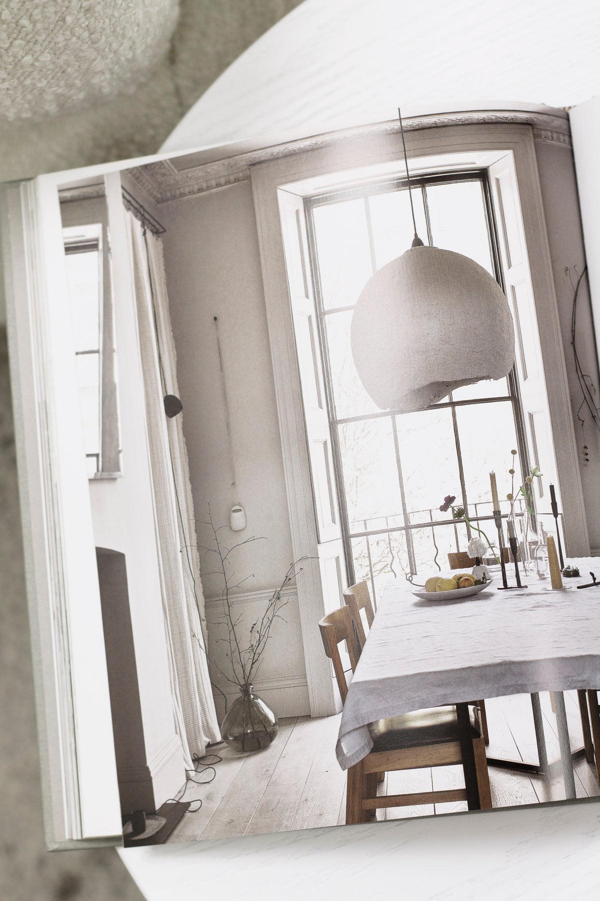 Calm interiors book page spread showing a living room interior