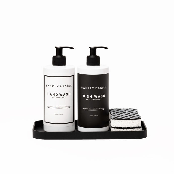 A durable Barkly Basics silicone tray with a kitchen sponge caddie and two bottles of soap.