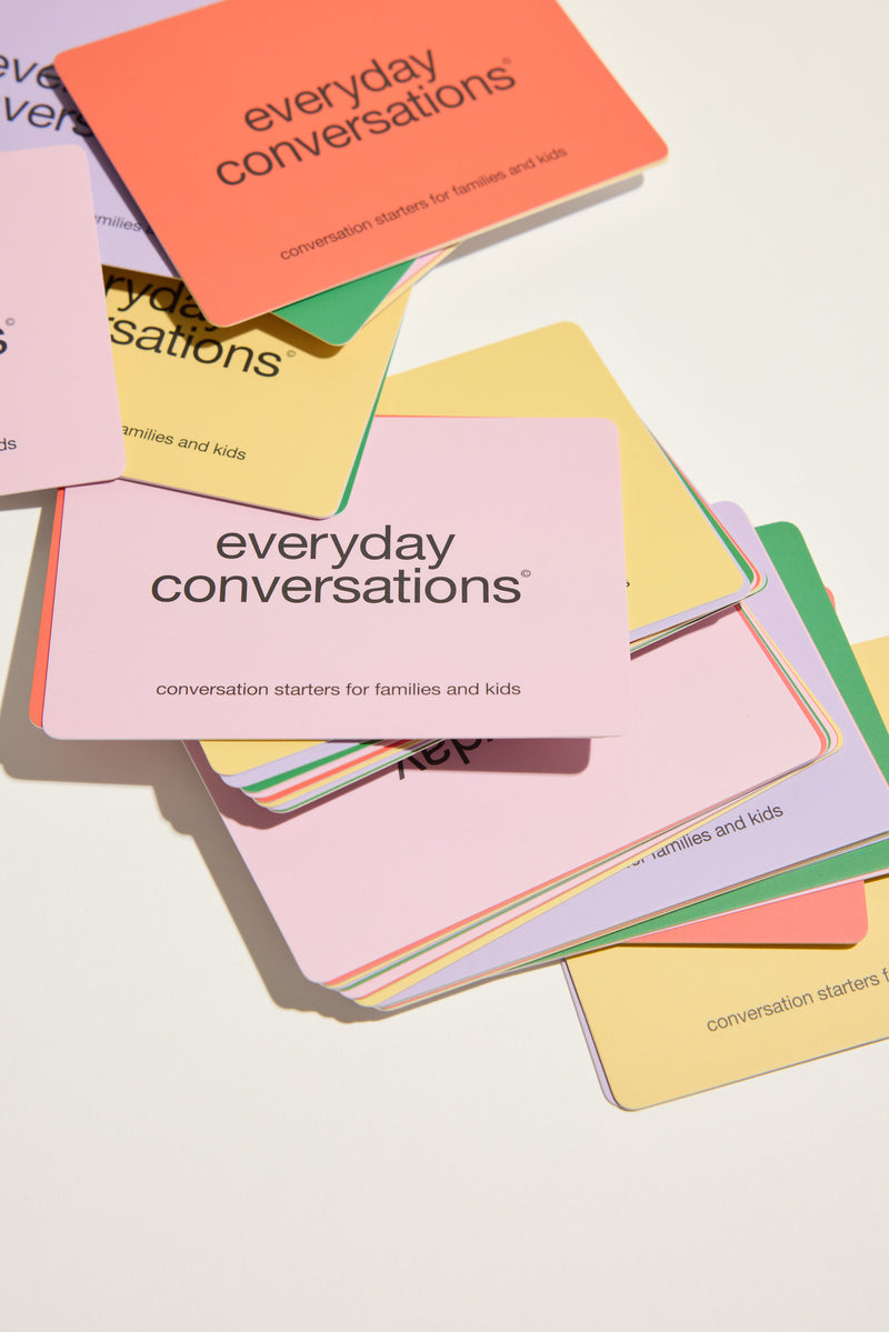 Everyday Conversations Kids and Family cards fanned out in coral, yellow, green and lilac