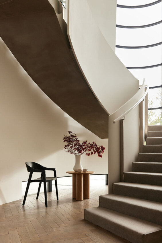 Round Side Table styled with decorative objects