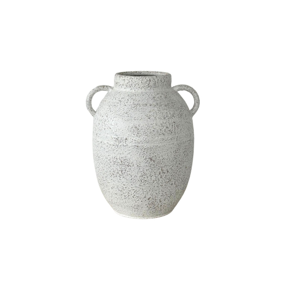 Vince rustic ceramic vase with textured weathered finish on a console