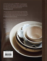 The back cover of CREATE: AT HOME WITH OLD & NEW by Books with plates and bowls on it.
