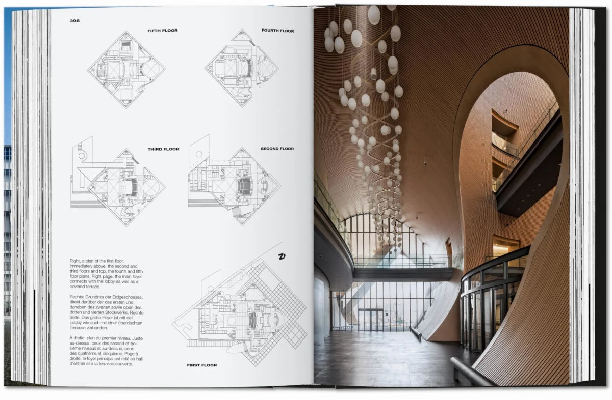 Ando Complete Works spread with four floor plans facing a vaulted interior hung with paper lanterns