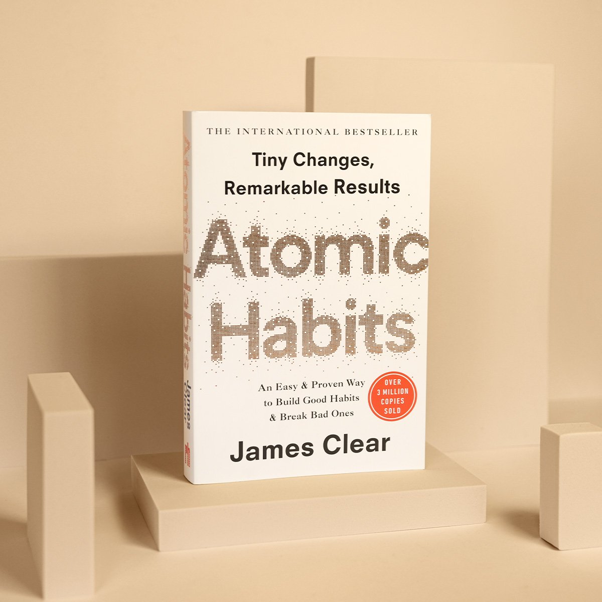 Atomic Habits by James Clear open page spread