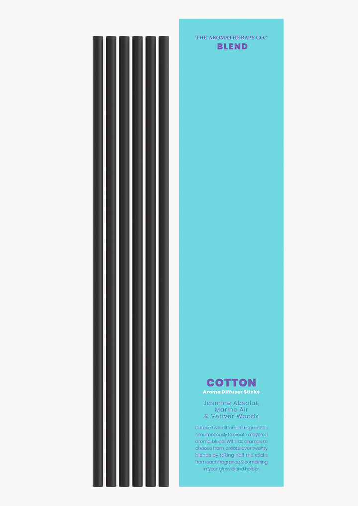 Cotton aroma sticks with the black reeds laid beside the blue Blend sleeve