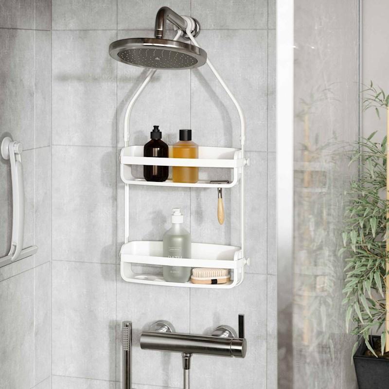 Umbra Flex shower caddy in white on a shower head holding bottles
