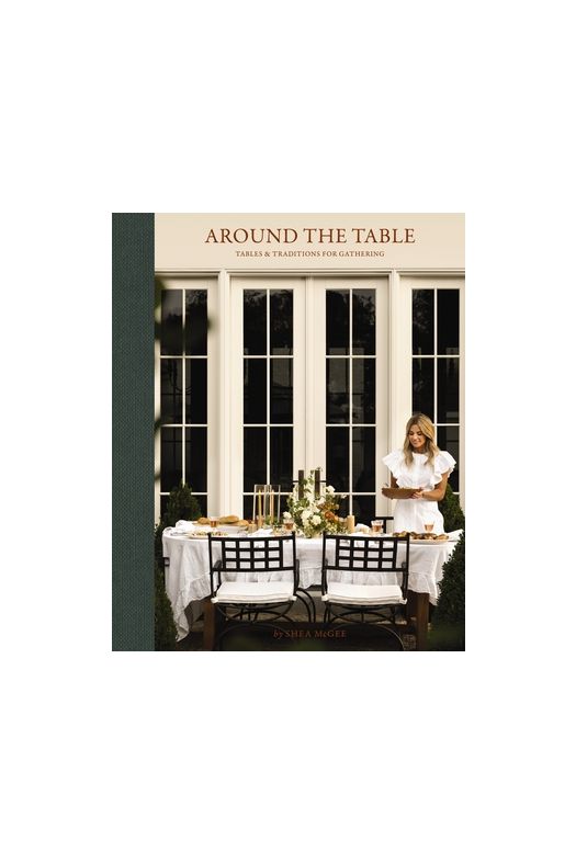 Around the Table by Shea McGee, cover showing a set dining table by tall glass doors