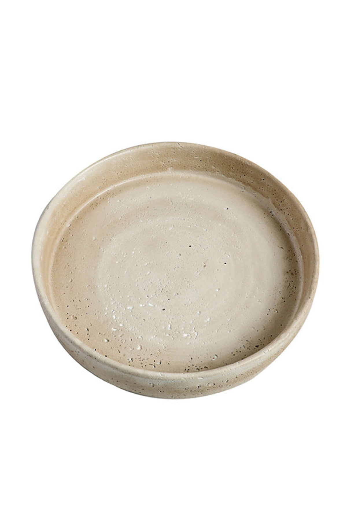 Sahara tray at an angle showing its low rim and speckled glaze
