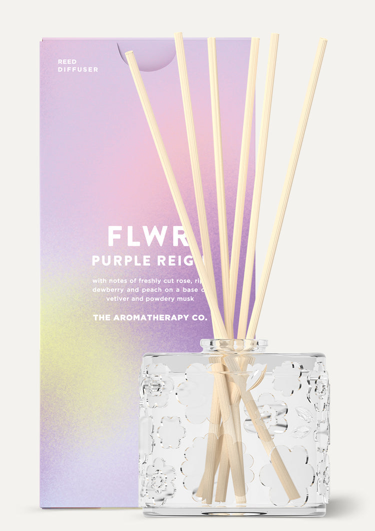 The Purple Reign diffuser beside its purple gradient FLWR carton, shown on white