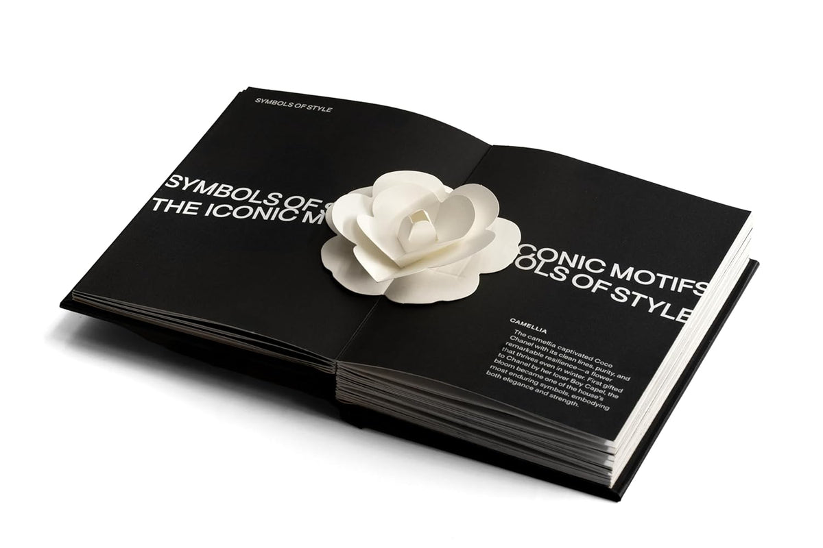 Fashion Unfolded Pop-Up Chanel styled on a coffee table