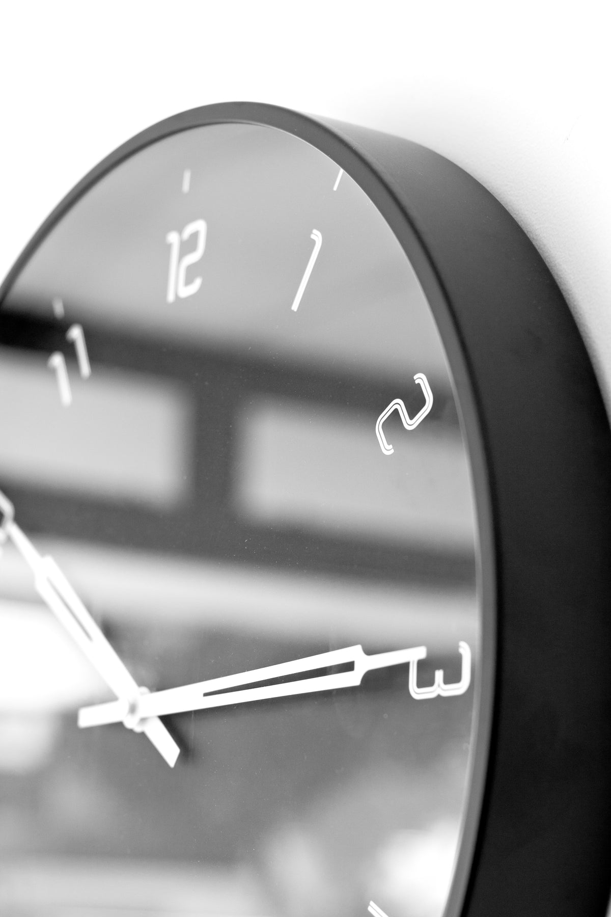 Close-up of the black Stark clock edge and glass