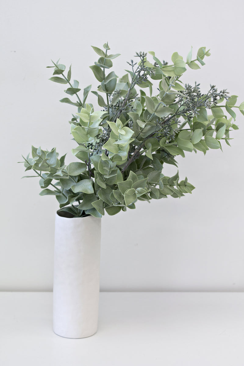 Seeded Eucalyptus Bundle in a white vase for floral styling by Artificial Flora.