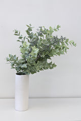 Seeded Eucalyptus Bundle by Artificial Flora in a white vase on a table, perfect for floral styling.