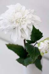 A Grand Border Dahlia - White in an Artificial Flora vase with artificial plants.