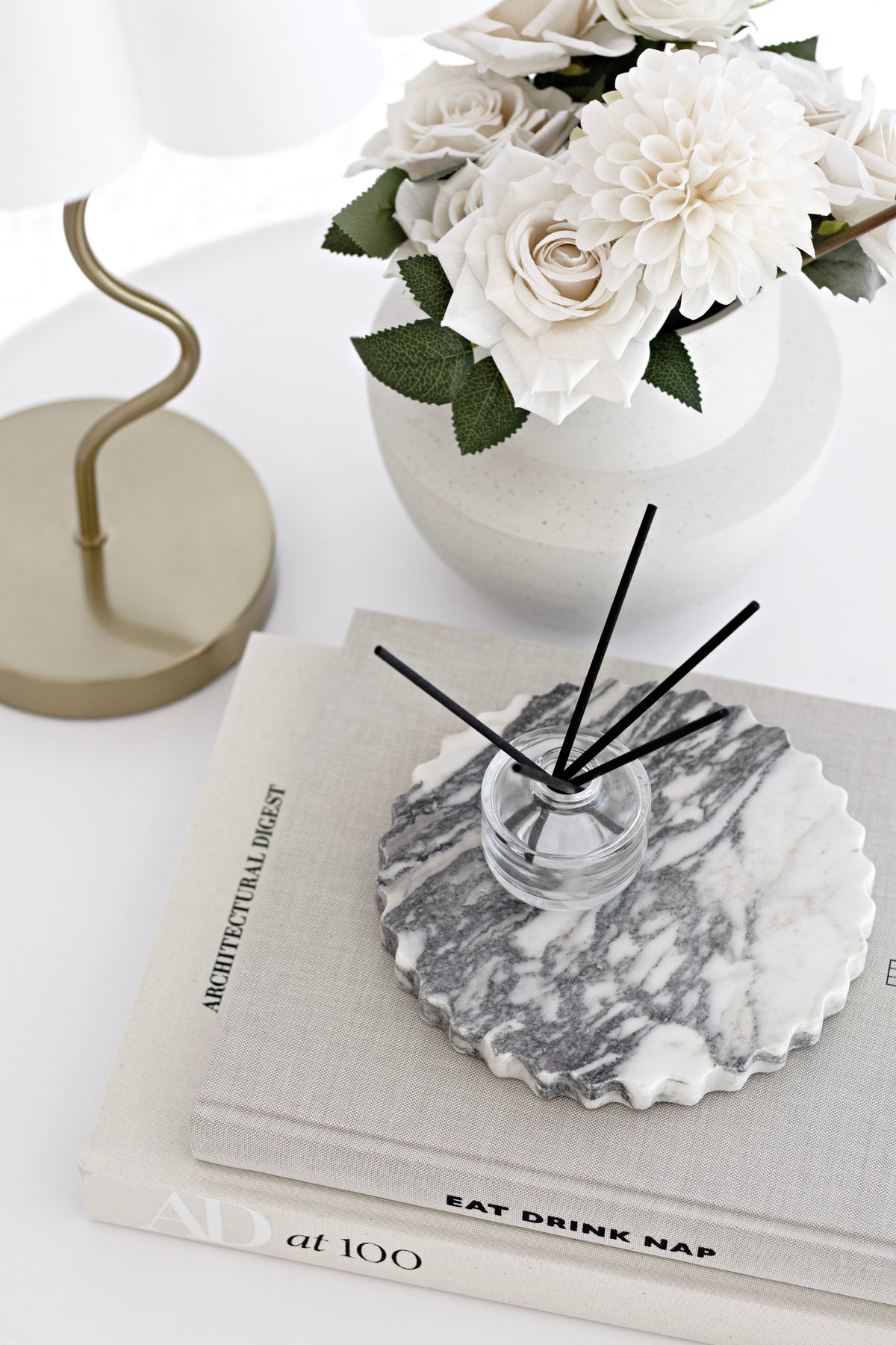 Eat Drink Nap Soho House book styled with home decor accessories