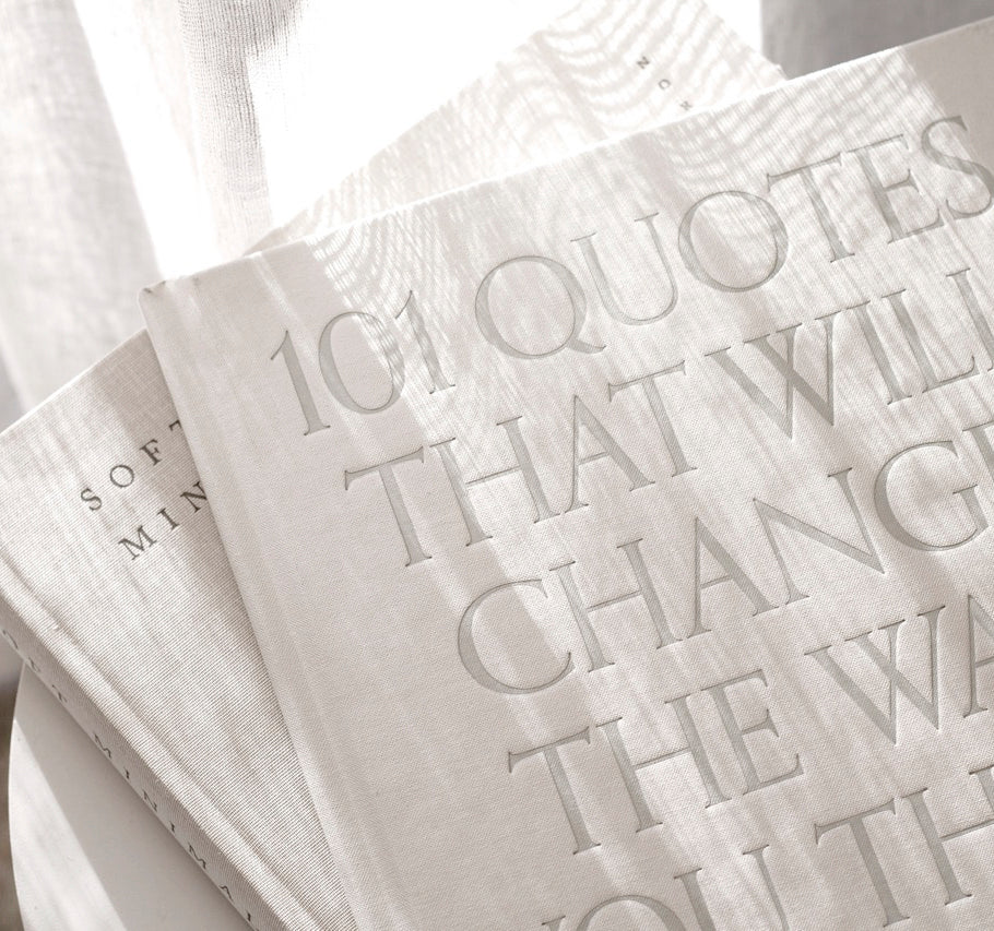 101 Quotes That Will Change The Way You Think book styled on a coffee table