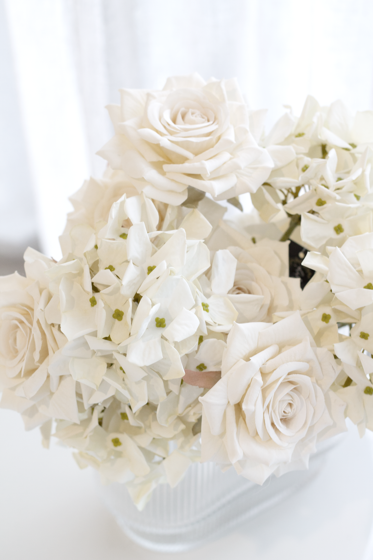 Petite faux hydrangea stem in cream