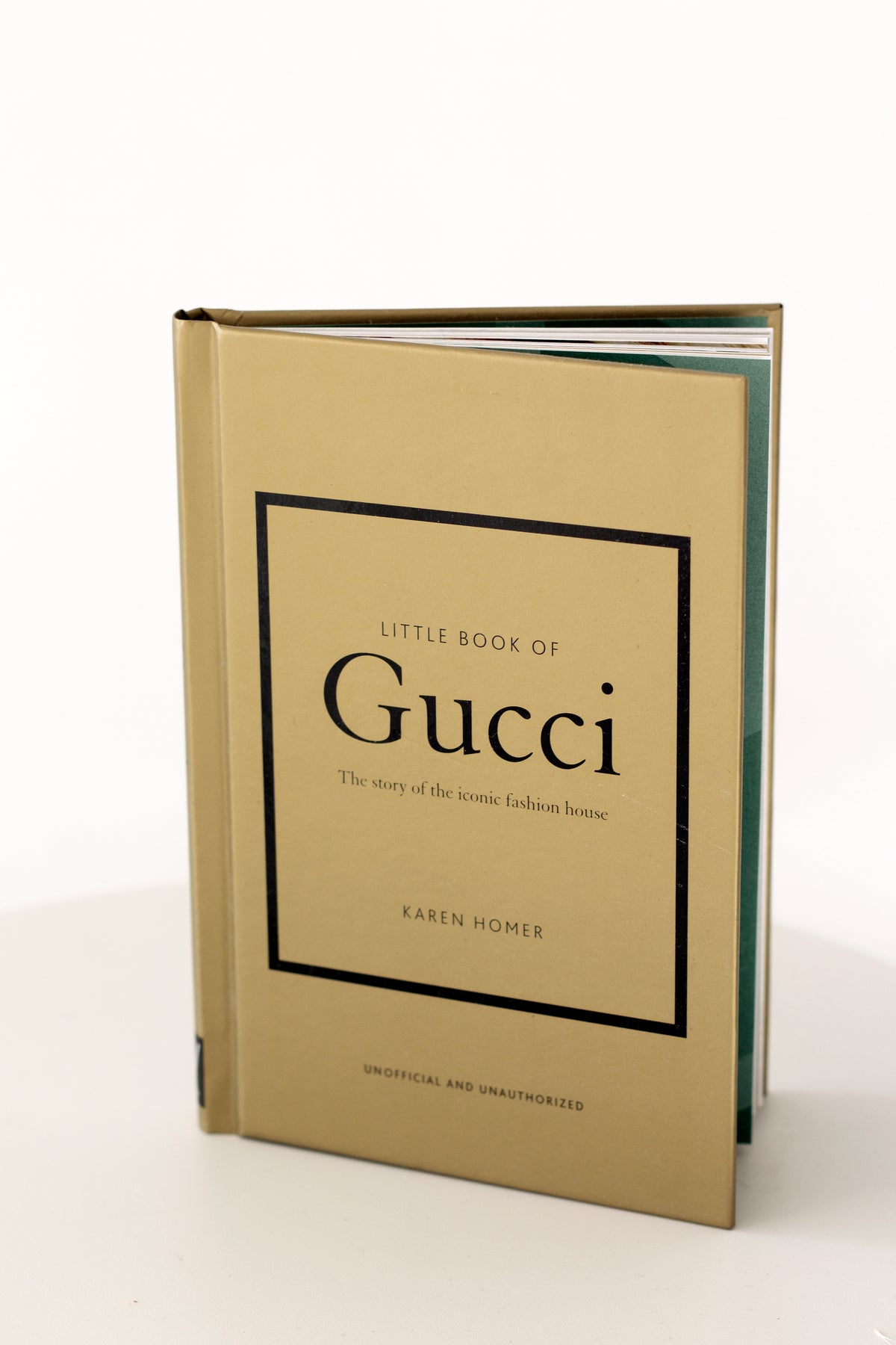 Little Book of Gucci page spread showing fashion photography