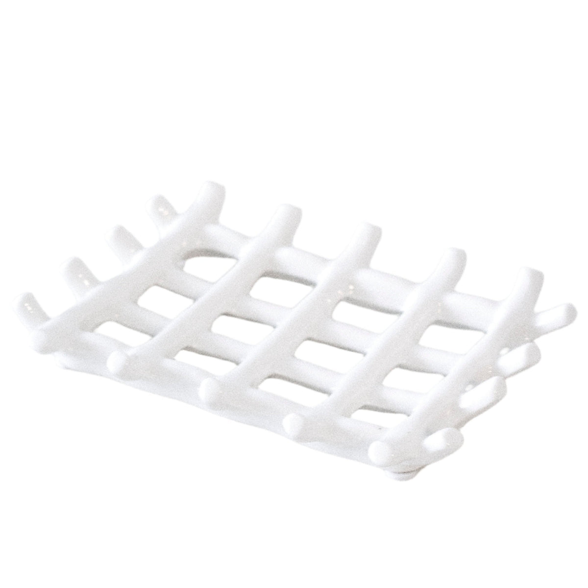 Edie soap dish in white ceramic, moulded as a woven lattice of rounded bars