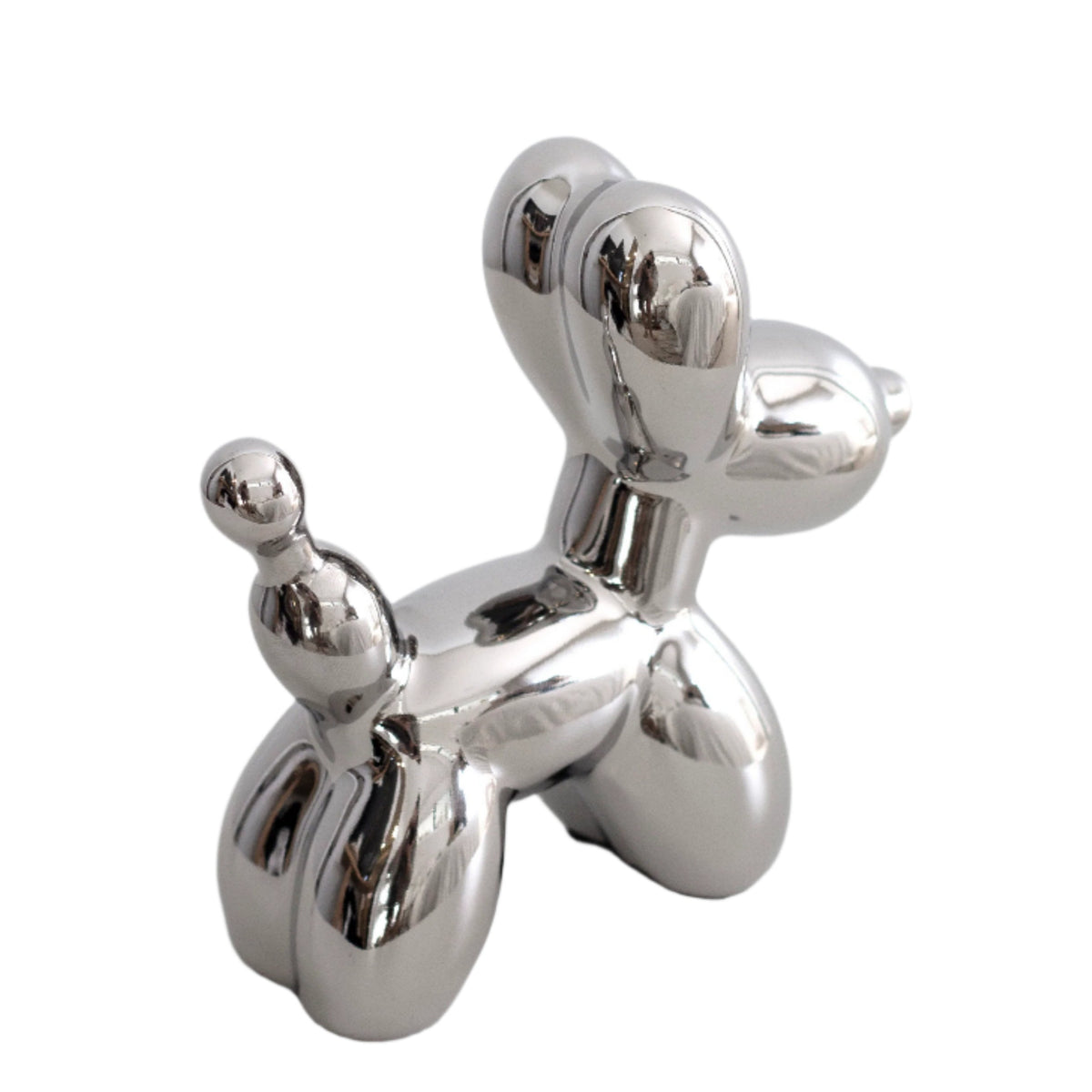 Silver ceramic balloon dog sculpture, side view on a white background