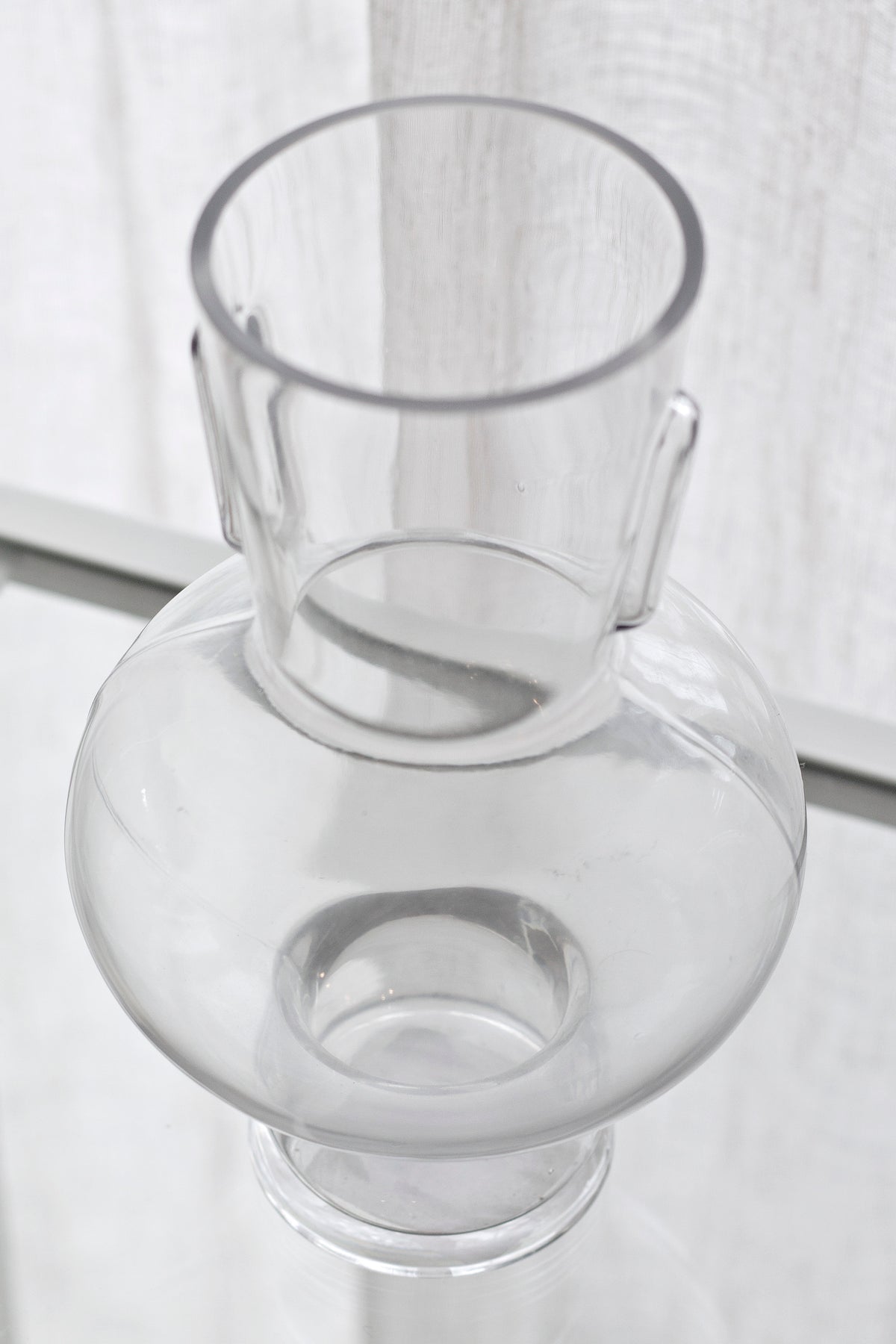 Closer angle on the Estrada vase, the wide bulb and narrow footed base catching daylight