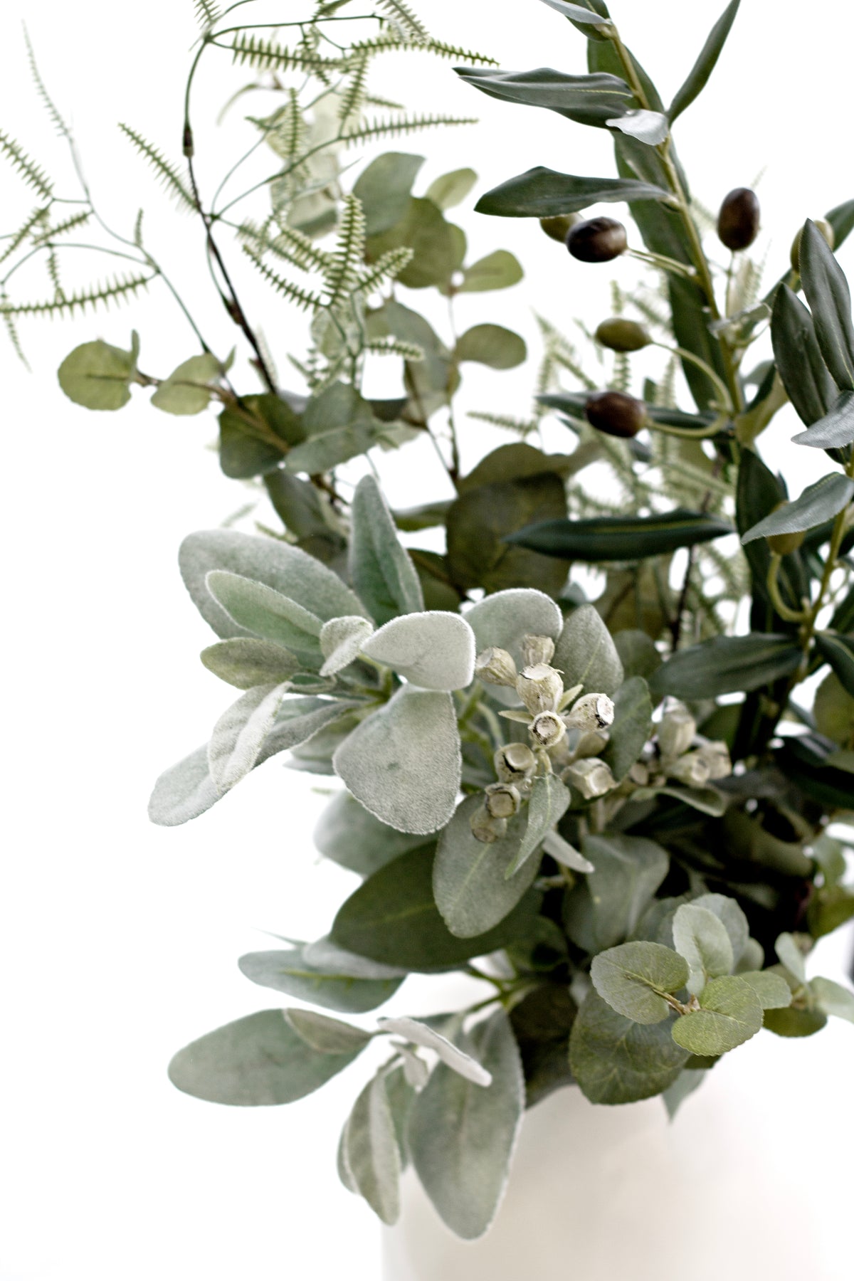 Lamb's ear faux stems styled in a ceramic vase