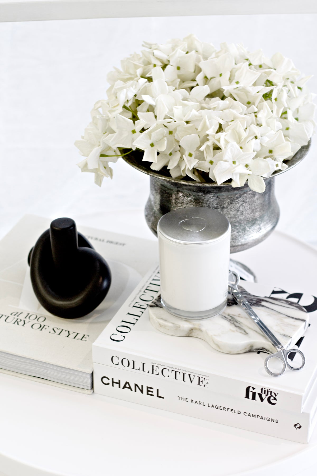 Chanel The Karl Lagerfeld Campaigns book styled with home decor