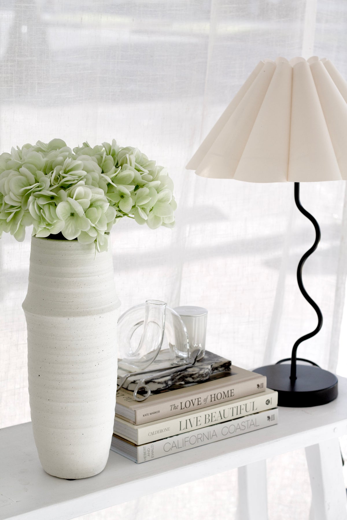 Live Beautiful book styled on a coffee table