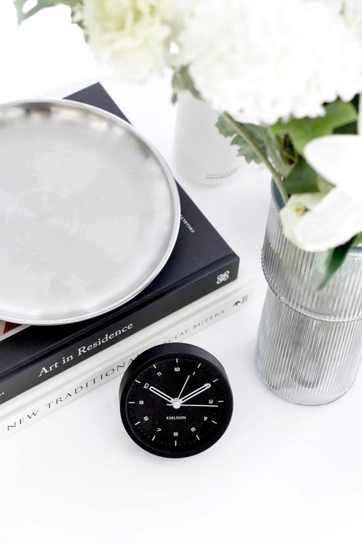 Karlsson Tinge Alarm Clock in black, close detail of the foldable foot