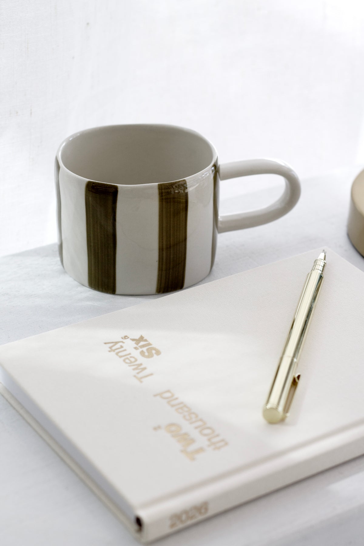 Fenton Stripe Mug styled on open shelving