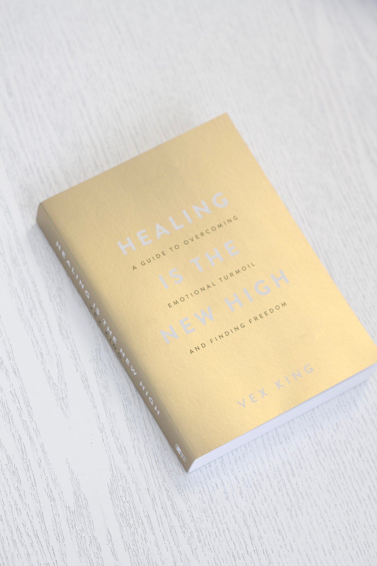 Healing Is the New High styled on a shelf