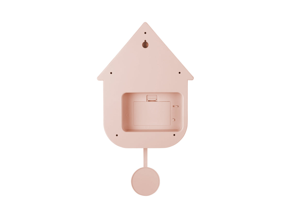 Karlsson Modern Cuckoo Clock in Soft Pink, rear view showing the battery compartment and pendulum