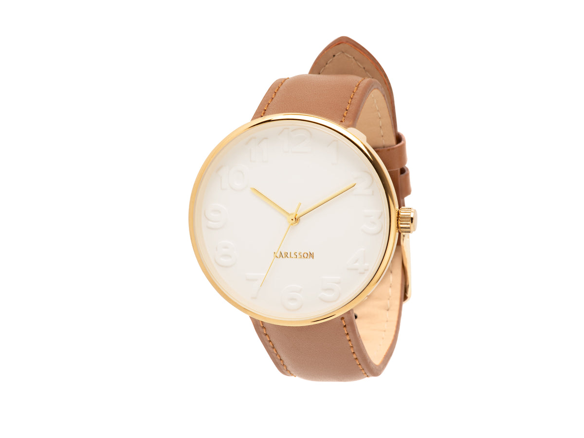 Karlsson Mr White Steel watch with a gold case and tan leather strap, shown at an angle