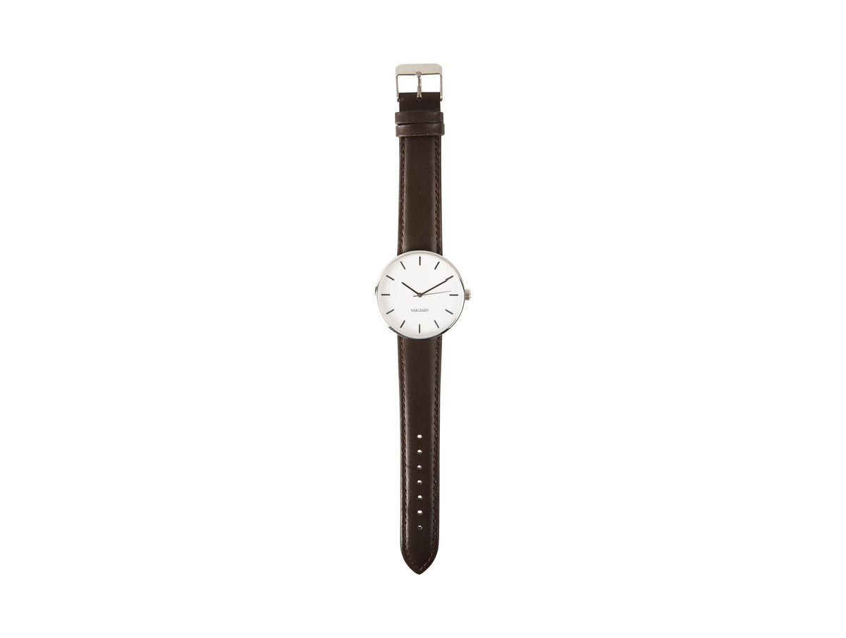 Karlsson Minimal watch in white photographed flat with the brown leather strap extended