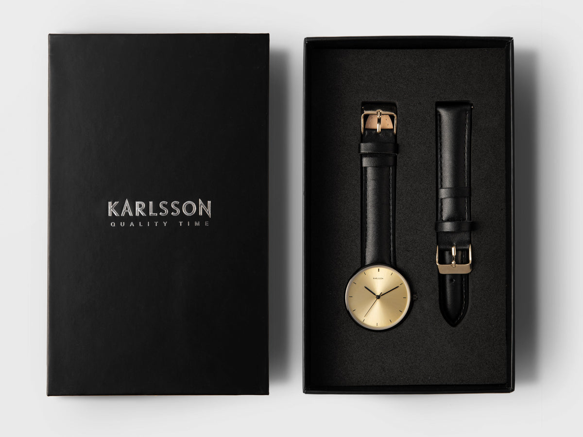 Karlsson Finesse watch in its black Karlsson presentation box with a spare black leather strap