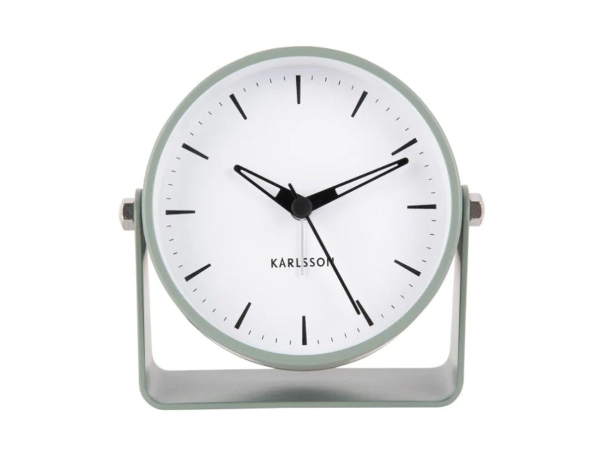 Front view of the Greyed Jade Karlsson Calm alarm clock with white dial