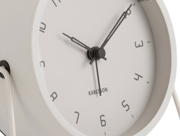 Karlsson Stark Alarm Clock in warm grey, close detail of the night light button