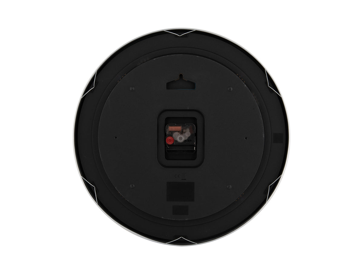Reverse of the Karlsson Elegance Glow Wall Clock showing the black backplate, battery housing and keyhole hanger