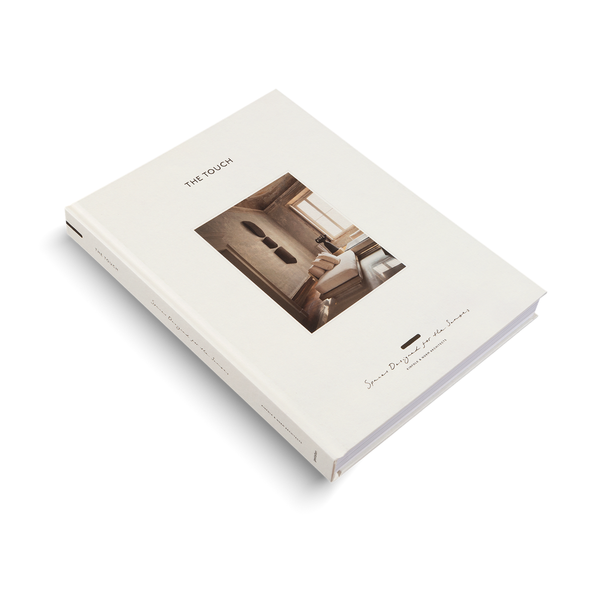 The Touch hardcover lying flat, its cover showing a calm interior