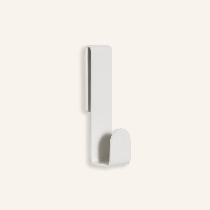 Fold Loop Hook White mounted in a bathroom by Made of Tomorrow