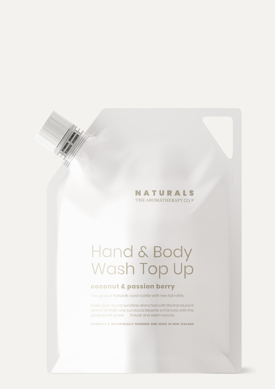 Naturals Coconut & Passion Berry Hand & Body Wash Top Up refill pouch on a pale background