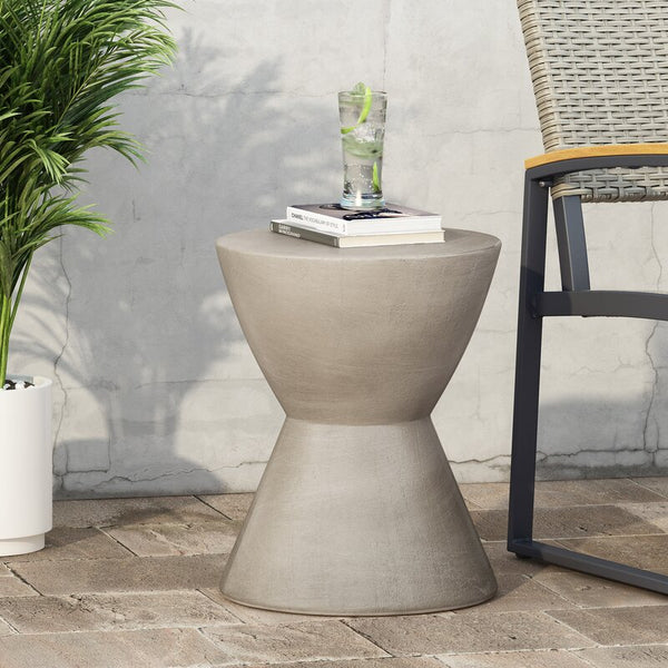 Flux Home's Westside Round Accent Table - Stonewash / Black is a lightweight concrete side table.